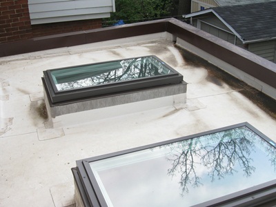 The flat roof with TPO membrane. Installed two years earlier. The flat roof with TPO membrane. Installed two years earlier.