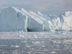 Iceberg calving in Ilulissat, Greenland Iceberg calving in Ilulissat, Greenland