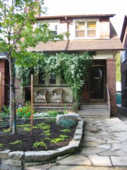 Our house - porch, trellis, stone walk, garden all done by yours truly Our house - porch, trellis, stone walk, garden all done by yours truly
